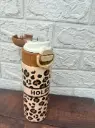 HOLIDAY Brand travel mug featuring a brown lid and a beige leopard print design 